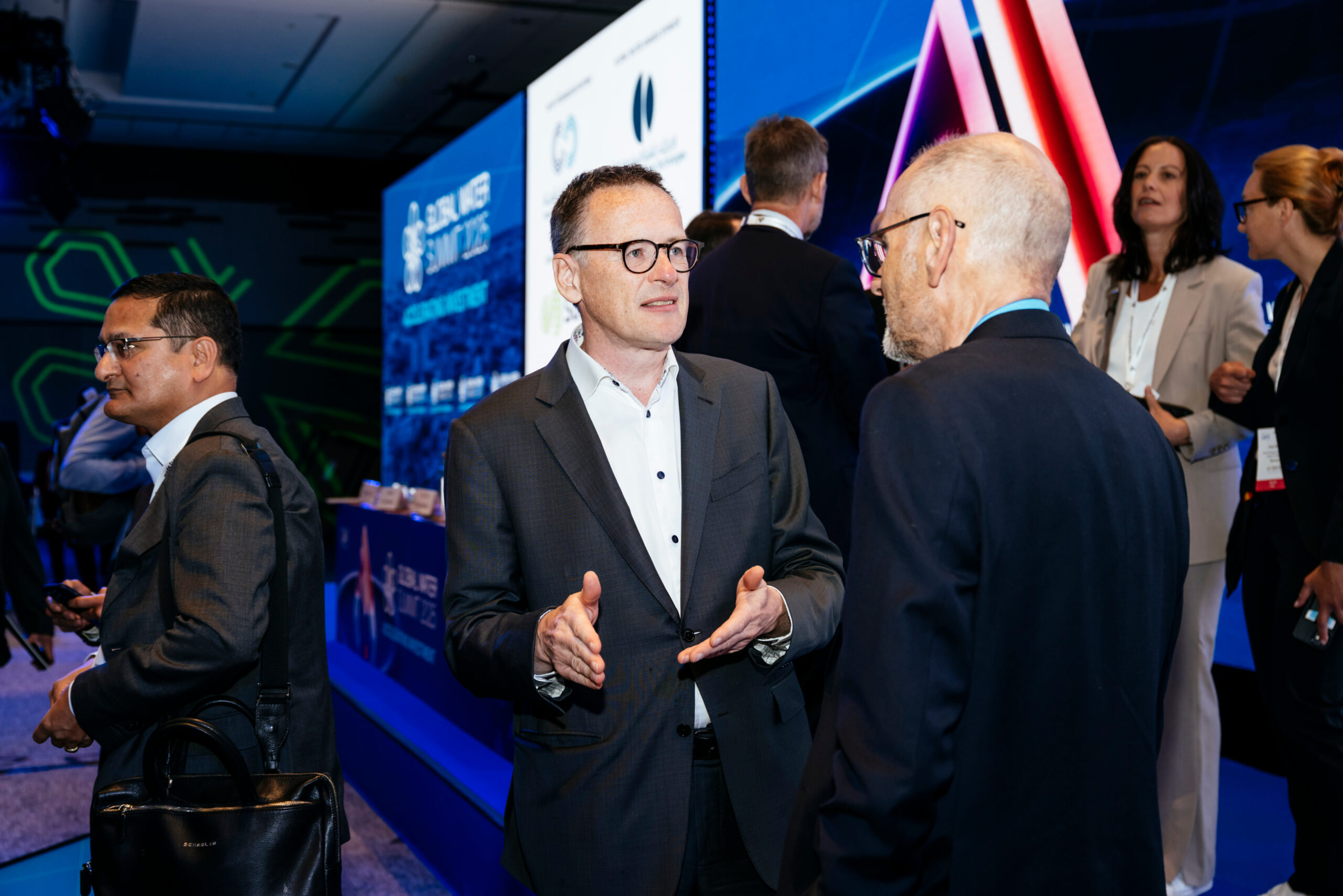 Christopher Gasson talks to speakers in Paris 2025